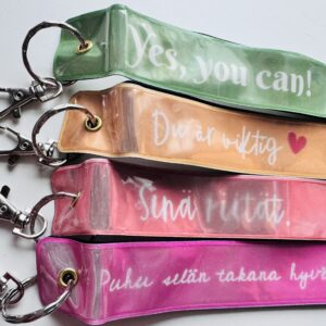 Heijastin tsemppitekstillä